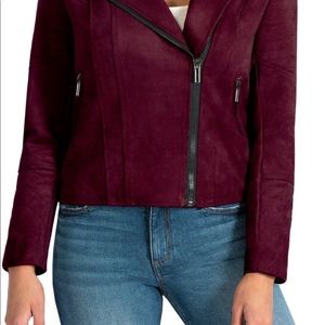Luxe vegan suede jacket is a wardrobe staple. Moto-style silhouette.